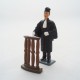 Figurine lawyer Grande holding to the bar